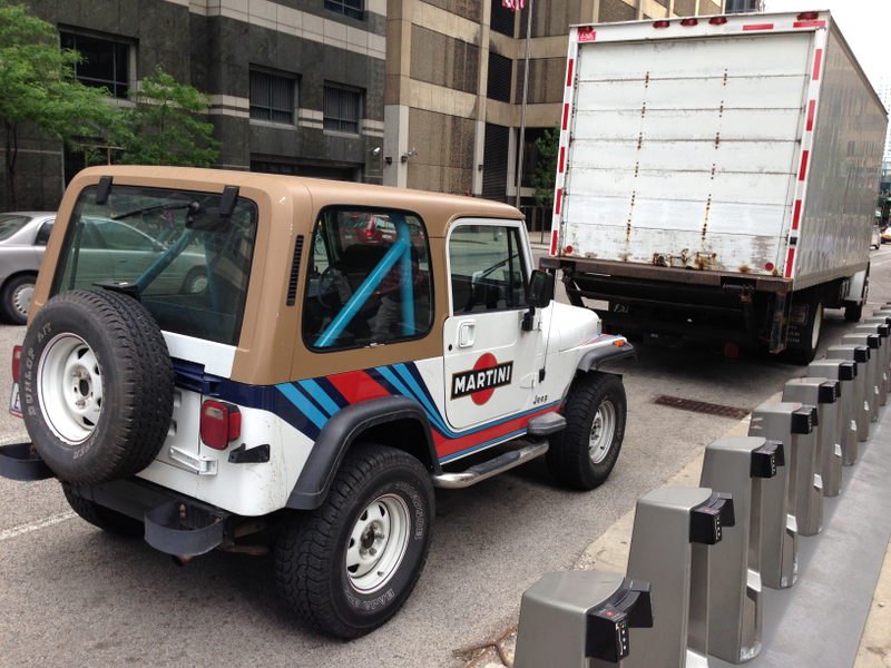 Illustration for article titled Martini Livery On A Jeep Wrangler Is Real, And It's Spectacular